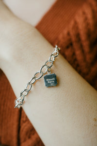 Sterling Silver Charm With Silver Bracelet (Available in Blue Topaz Gemstone Only) )