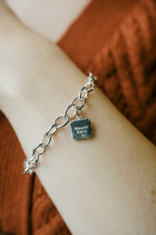 Sterling Silver Charm With Silver Bracelet (Available in Blue Topaz Gemstone Only) )