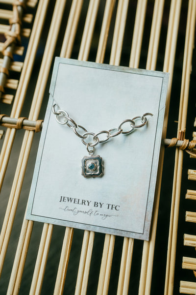 Sterling Silver Charm With Silver Bracelet (Available in Blue Topaz Gemstone Only) )